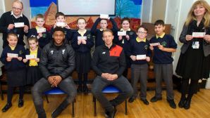 Lucas and Gomez deliver tickets to local school pupils