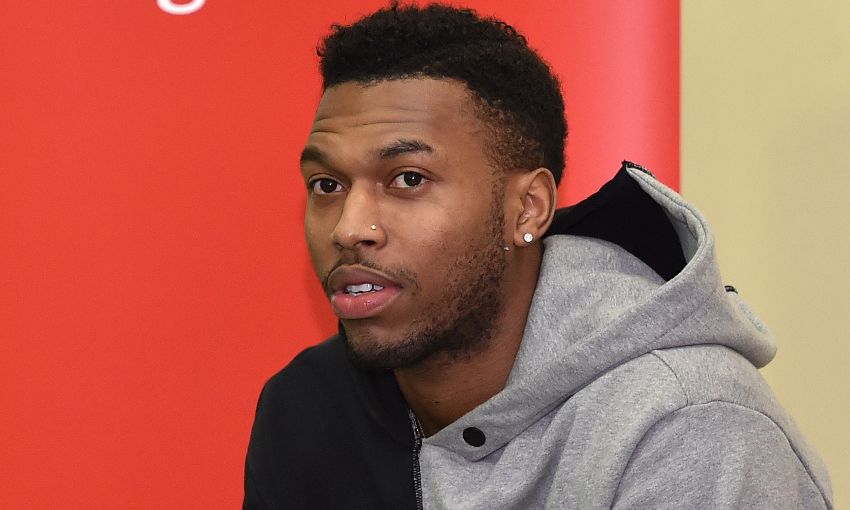 Sturridge delivers tickets to Reds fans at local school
