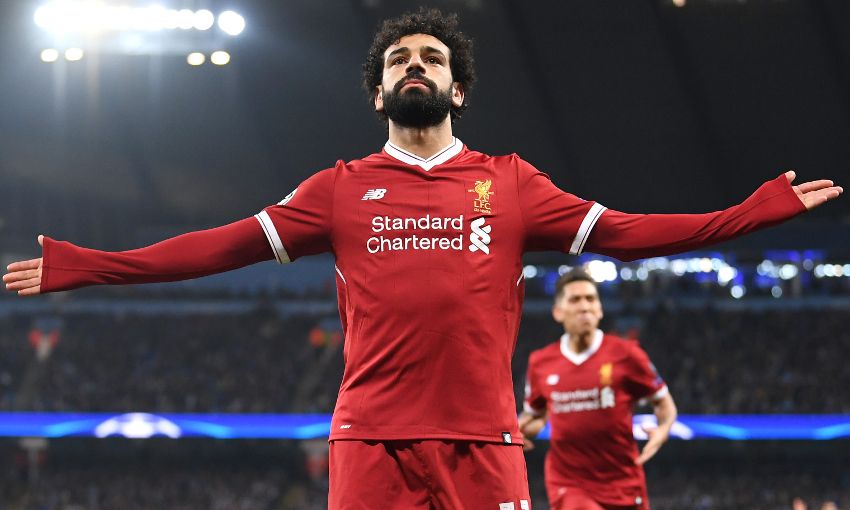 Salah celebrated after scoring