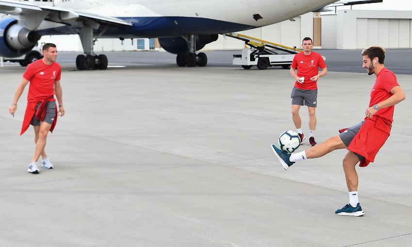 Liverpool players have a kickabout at Charlotte airport