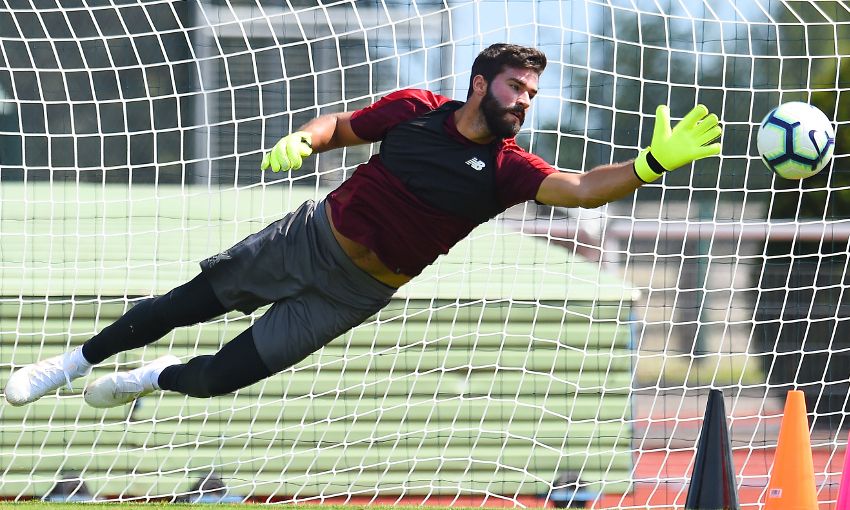 Alisson Becker trains with Liverpool in Evian, France.