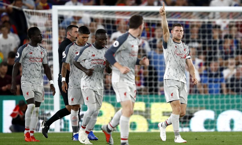 James Milner celebrates a goal for Liverpool