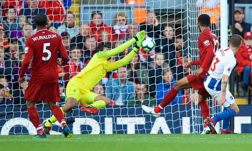 Liverpool's Alisson makes a save against Brighton