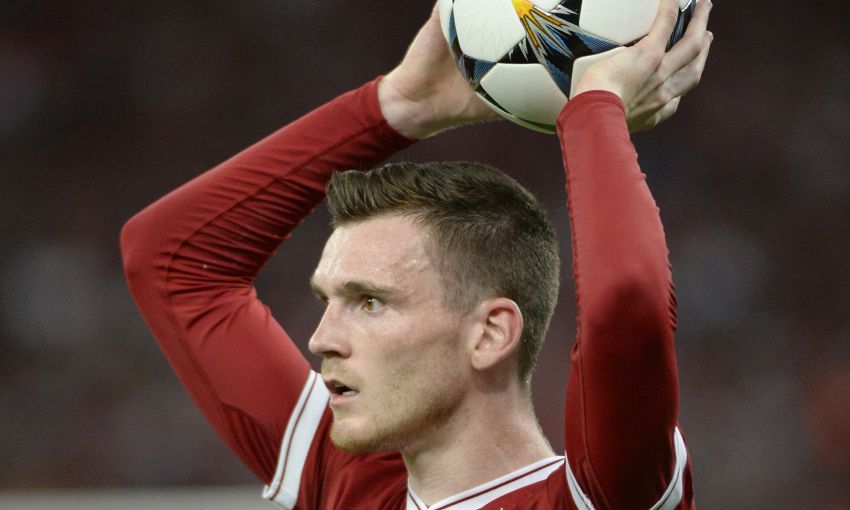 Andy Robertson takes a throw-in for Liverpool