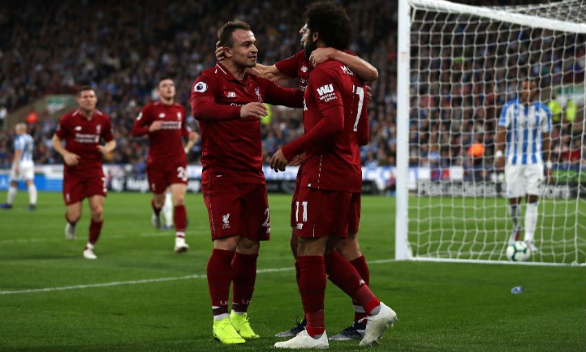 Xherdan Shaqiri and Mohamed Salah celebrate during Liverpool FC v Huddersfield Town