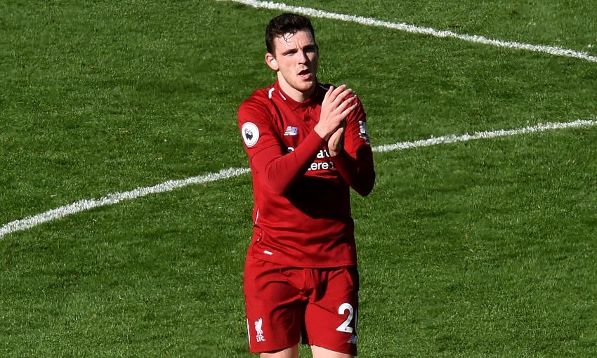 Andy Robertson applauds the fans at Anfield