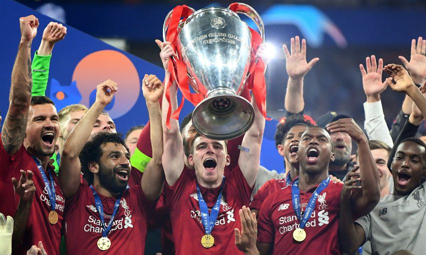 Andy Robertson of Liverpool FC lifts the Champions League trophy