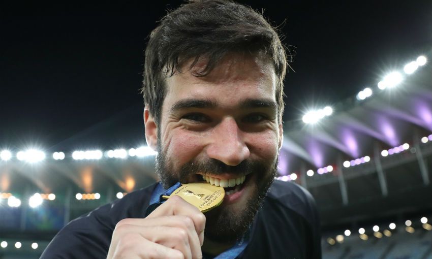 Alisson Becker of Brazil with Copa America medal