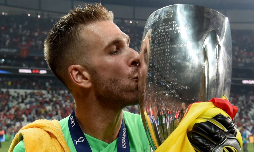 Adrian celebrates with the UEFA Super Cup