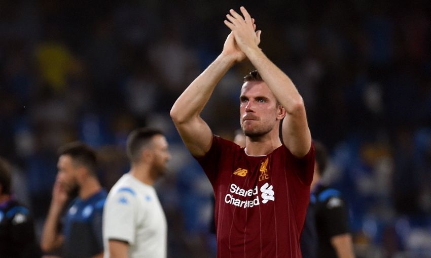 Jordan Henderson applauds the fans after Napoli v Liverpool