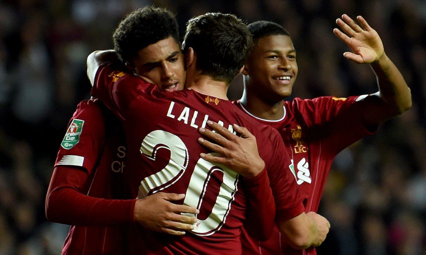 Liverpool celebrate a goal against MK Dons