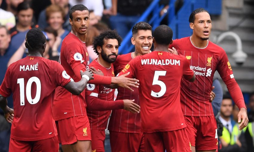 Liverpool celebrate a goal at Stamford Bridge