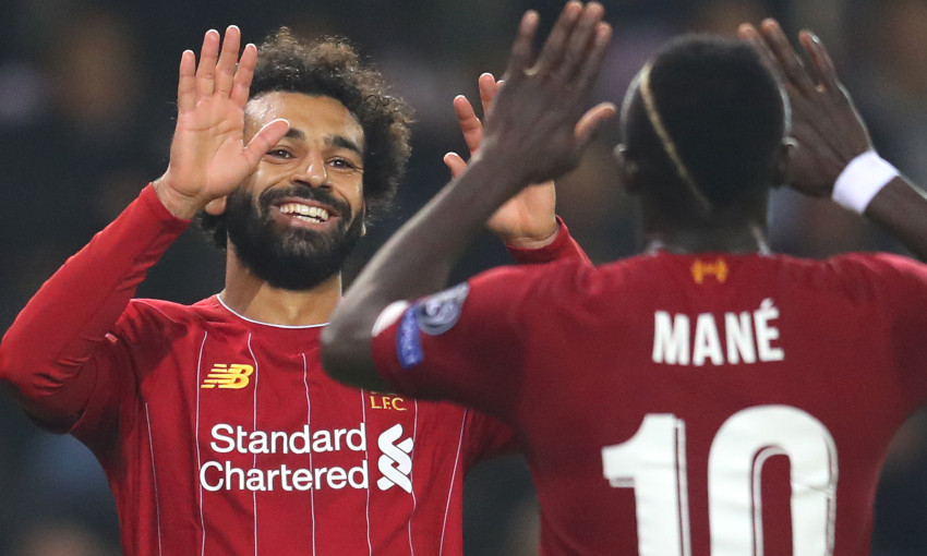 Mohamed Salah and Sadio Mane celebrate at Genk