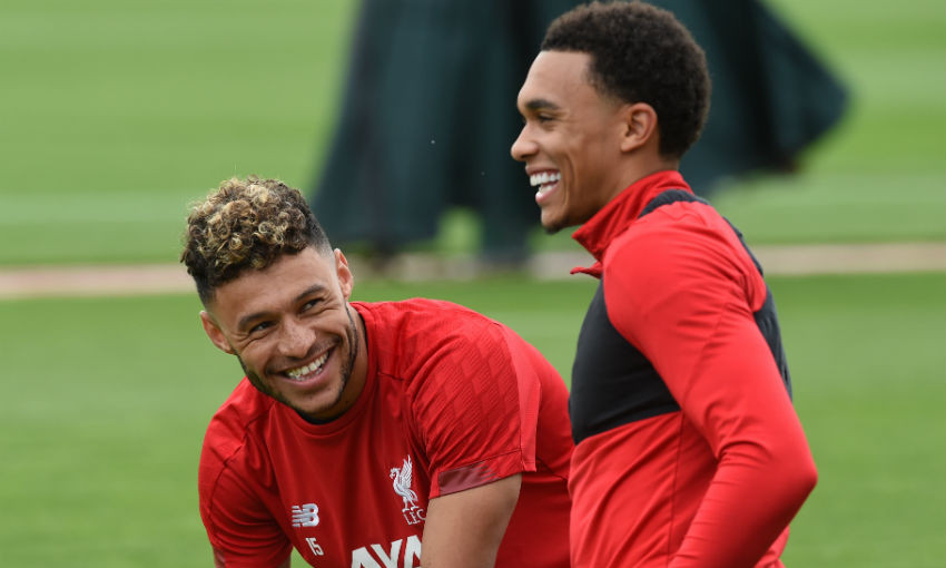 Alex Oxlade-Chamberlain with Trent Alexander-Arnold of Liverpool during a training session at Melwood Training Ground on August 22, 2019 in Liverpool, England.