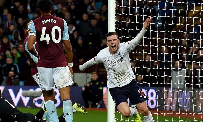 Andy Robertson celebrates scoring against Aston Villa