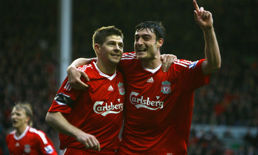 Steven Gerrard and Albert Riera of Liverpool FC