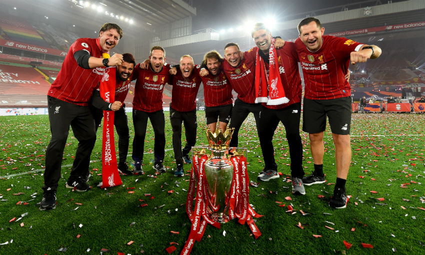 Liverpool FC coaching staff with the Premier League trophy