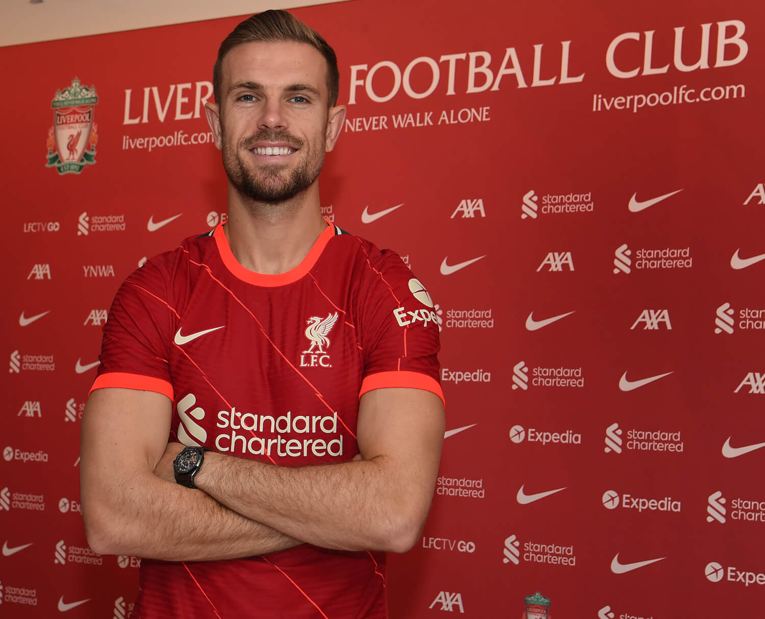 Gallery: Jordan Henderson seals new deal at AXA Training Centre - Liverpool  FC