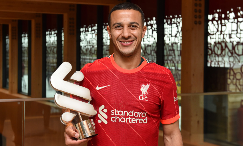 Thiago Alcantara collects the Standard Chartered Player of the Month award